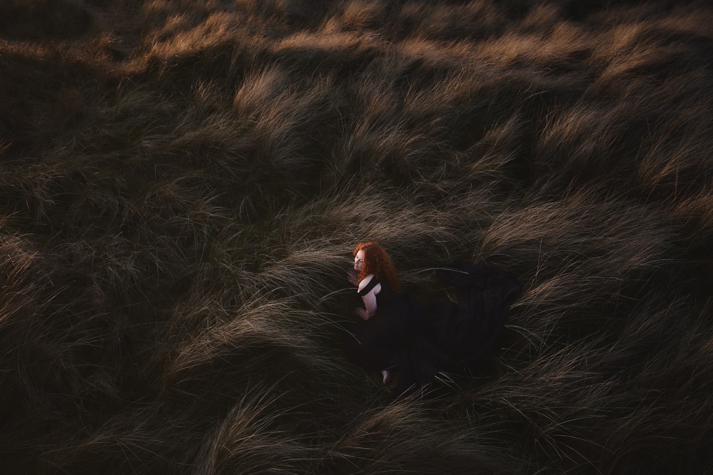 The Wind Knows Her Name — figure in windswept dunes
